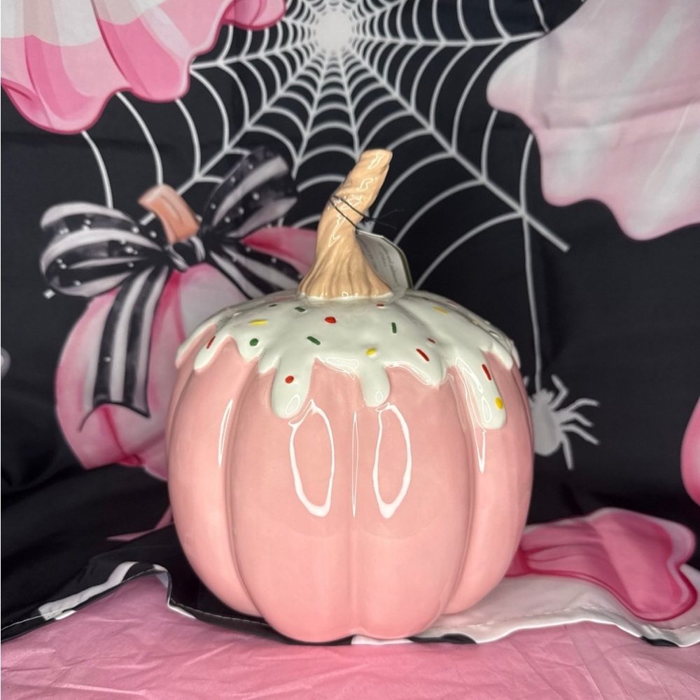 Cupcakes and Cashmere Halloween sprinkle frosted pink pumpkin